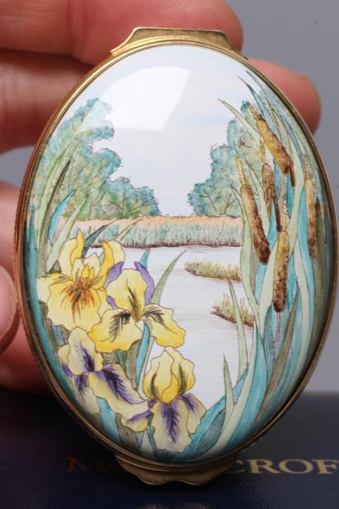 A MOORCROFT ENAMEL OVAL BOX AND COVER, 2018, painted with the Willow Fen pattern, black printed Image