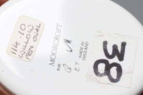 A MOORCROFT ENAMEL OVAL BOX AND COVER, 2018, painted with the Willow Fen pattern, black printed Image