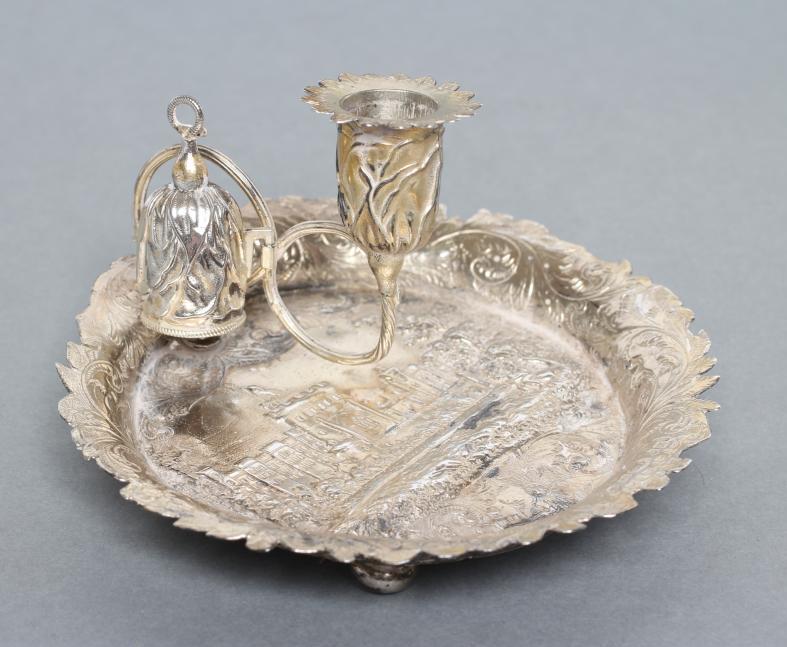 AN EARLY VICTORIAN SILVER "CASTLE TOP" CHAMBERSTICK Image