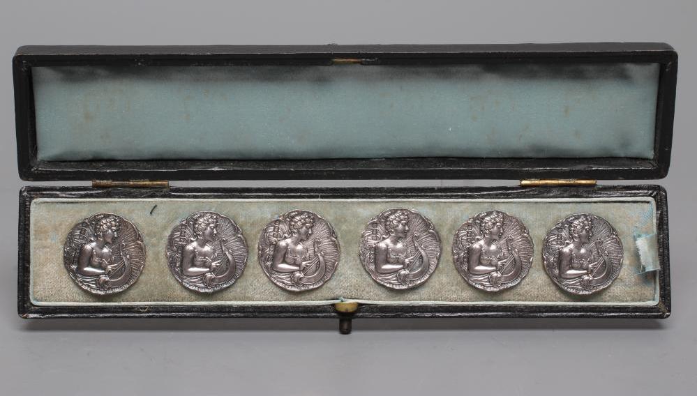 A SET OF SIX LATE VICTORIAN ART NOUVEAU SILVER BUTTONS, maker Saunders & Shepherd, Birmingham 1901, Image