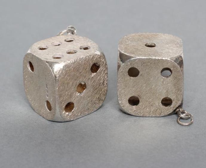 A PAIR OF SILVER HOLLOW DICE, maker's mark indistinct, London 1975, with hanging loops, 3/4" wide Image