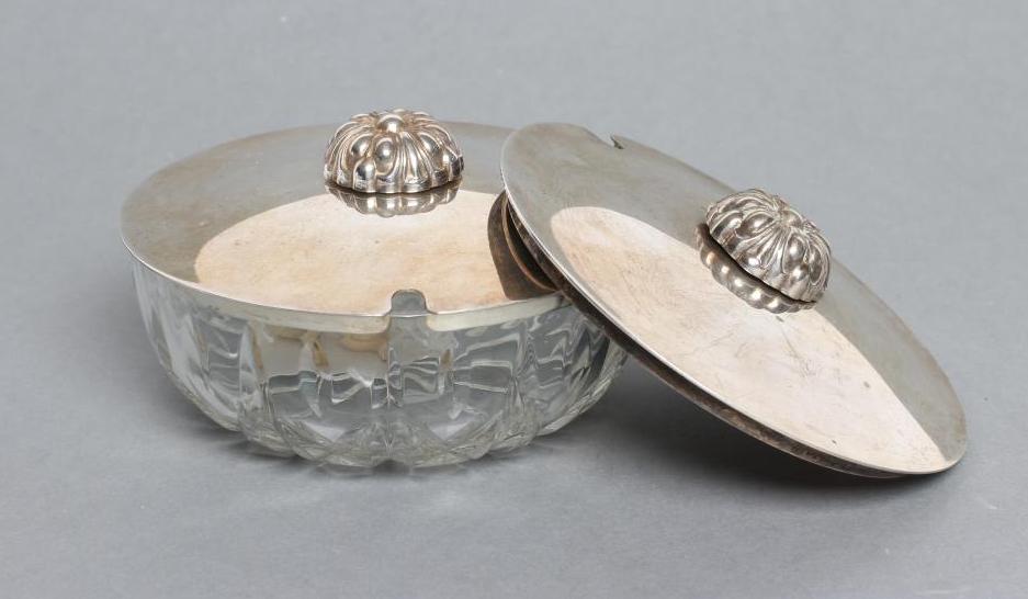 A GLASS PRESERVE DISH with silver cover Image