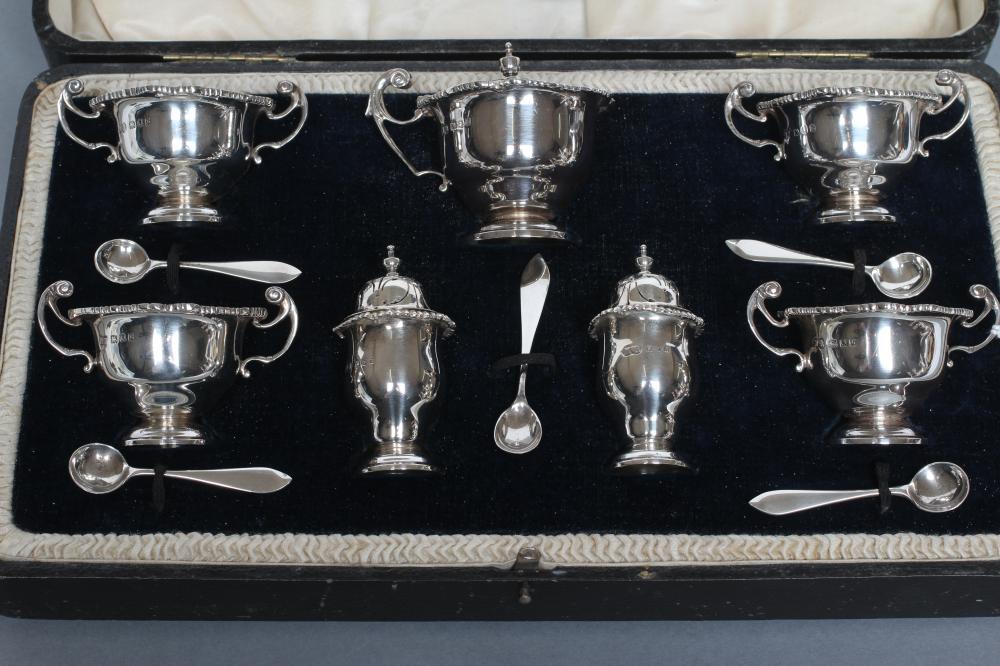 A SEVEN PIECE SILVER CRUET Image