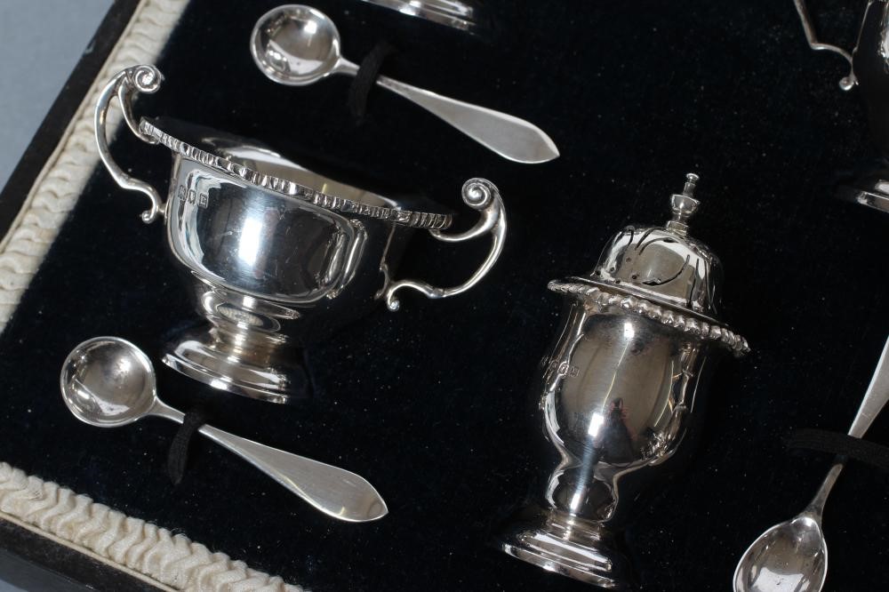 A SEVEN PIECE SILVER CRUET Image
