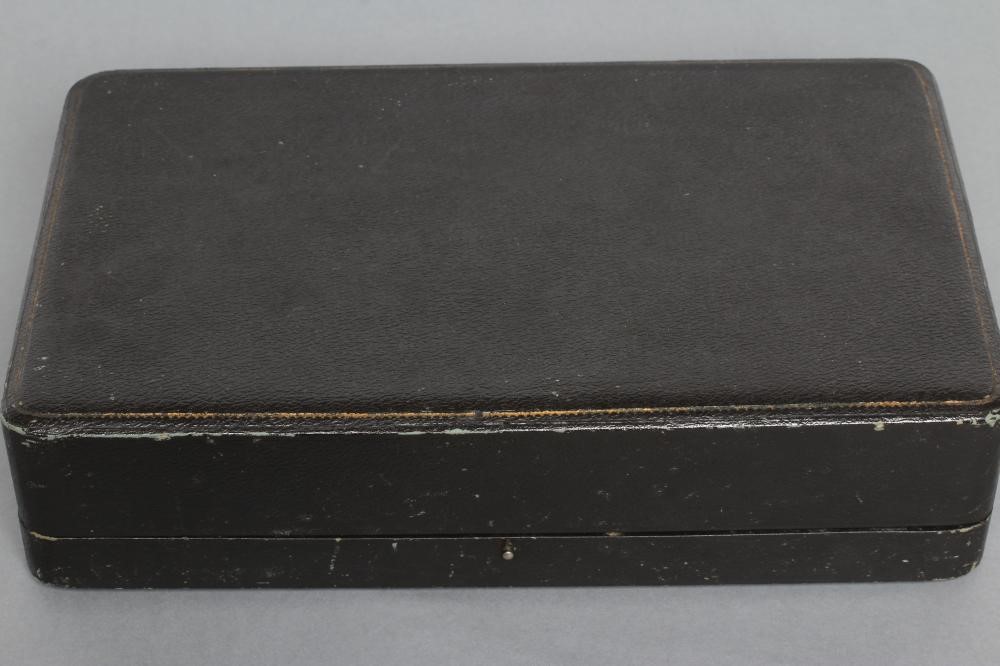 A SEVEN PIECE SILVER CRUET Image