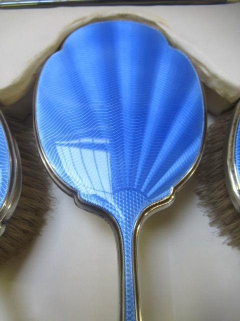 AN ART DECO SILVER SIX PIECE DRESSING TABLE SET Image