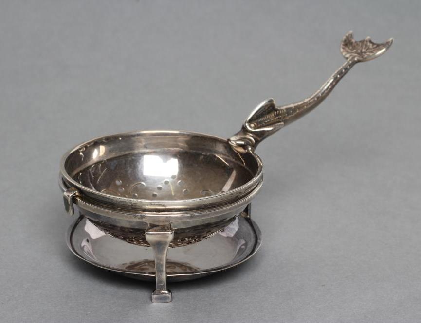 A SCOTTISH SILVER TEA STRAINER Image