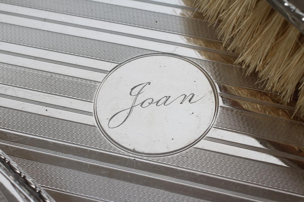 A SIX PIECE SILVER DRESSING TABLE SET Image