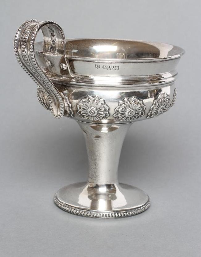 AN EDWARDIAN SILVER ARTS AND CRAFTS PEDESTAL CUP Image