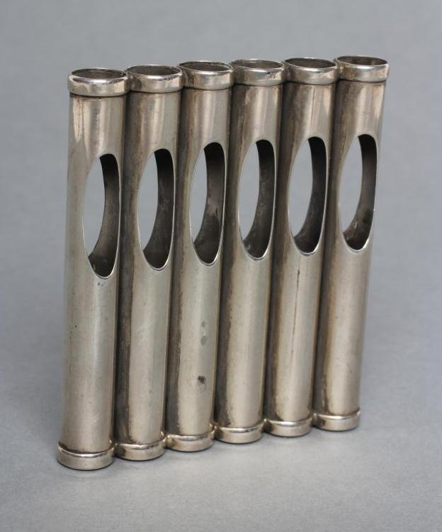 A PATENT "MAGAZINE" SILVER CIGARETTE CASE, maker possibly Wolffing and Marians, with six tubular Image