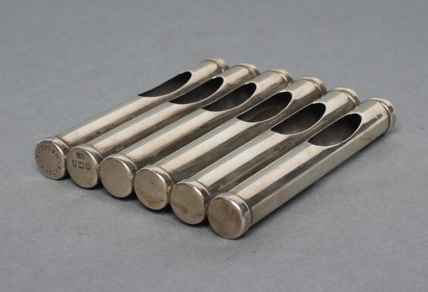 A PATENT "MAGAZINE" SILVER CIGARETTE CASE, maker possibly Wolffing and Marians, with six tubular Image