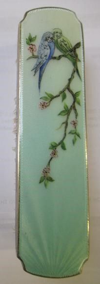 A THREE PIECE SILVER AND ENAMEL DRESSING TABLE SET Image