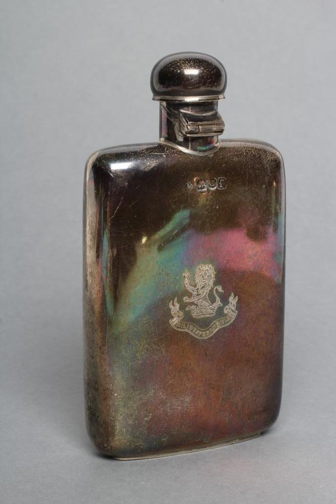 A LATE VICTORIAN SILVER HIP FLASK Image