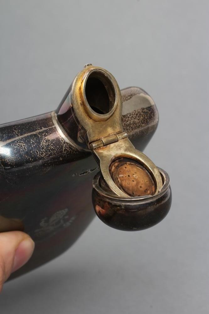 A LATE VICTORIAN SILVER HIP FLASK Image
