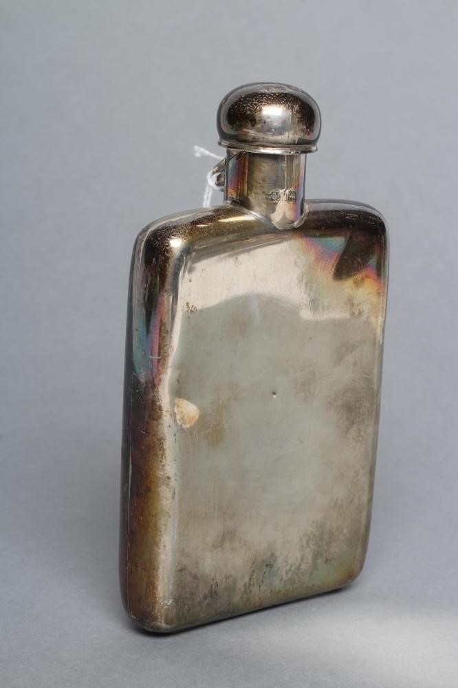 A LATE VICTORIAN SILVER HIP FLASK Image