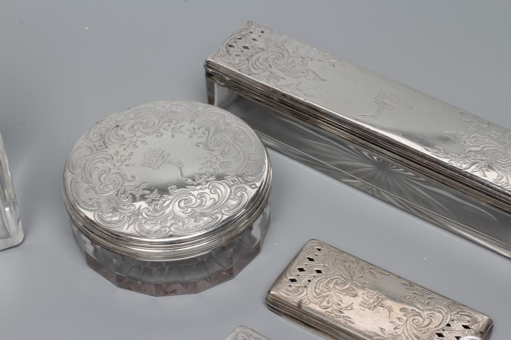 A GENTLEMAN'S EARLY VICTORIAN SILVER MOUNTED TRAVELLING DRESSING SET Image