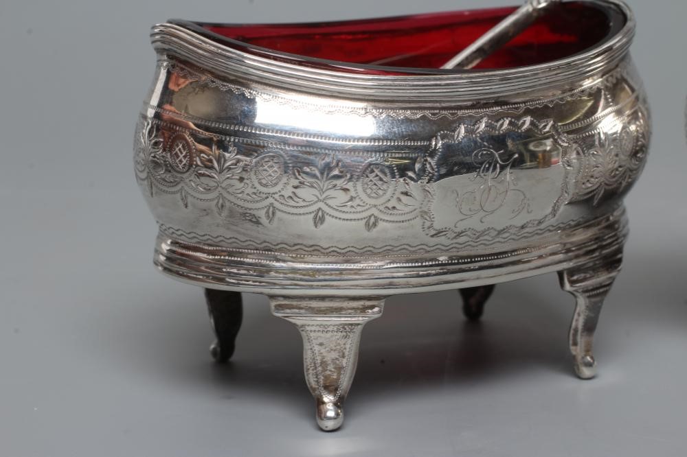 A PAIR OF LATE GEORGE III SILVER SALTS Image