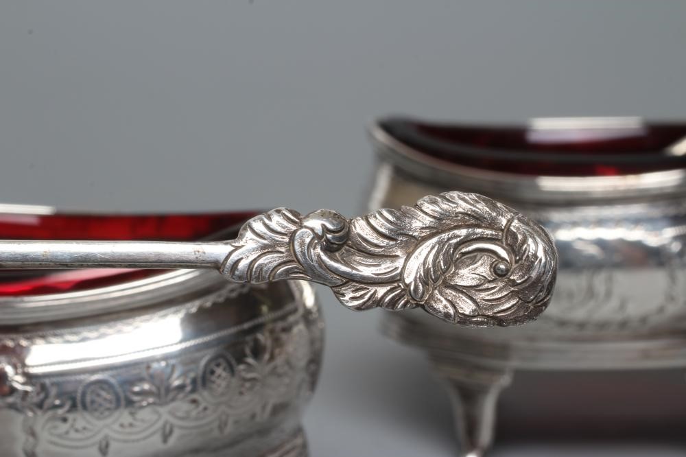 A PAIR OF LATE GEORGE III SILVER SALTS Image