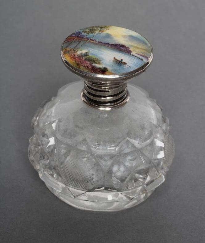 AN ART DECO GLASS SCENT BOTTLE of spherical form with slice and strawberry cut panels Image