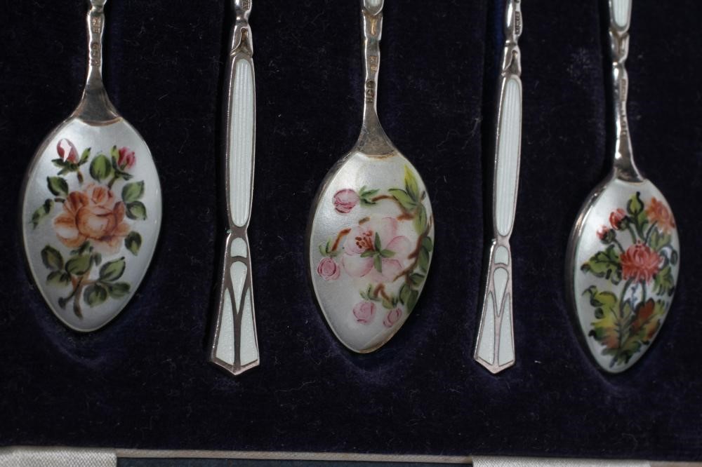 A SET OF SIX SILVER COFFEE SPOONS Image