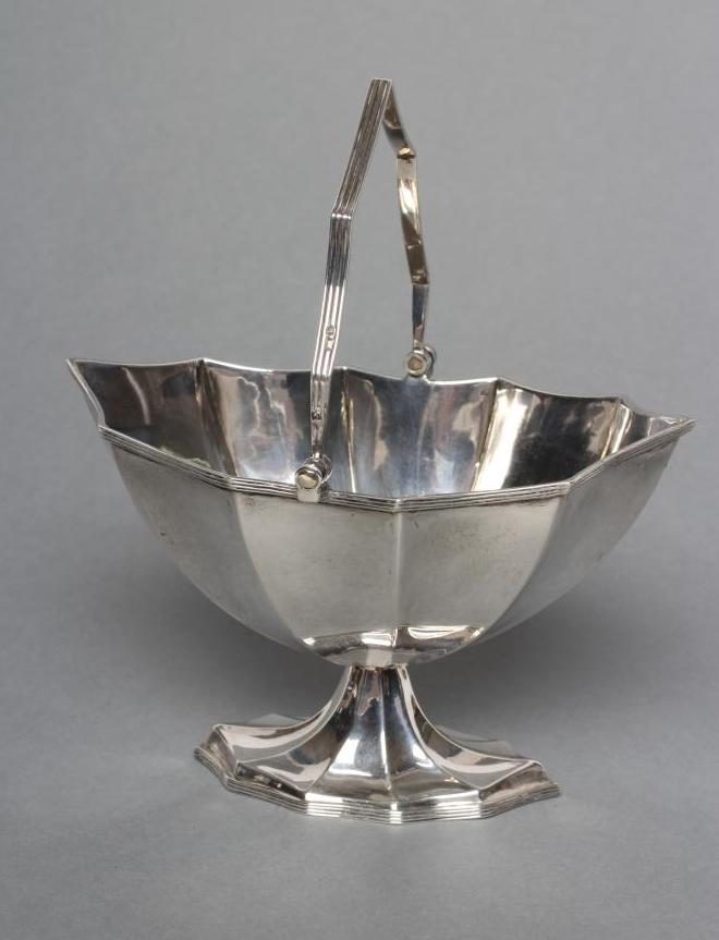 A LATE VICTORIAN SILVER SUGAR BASKET Image