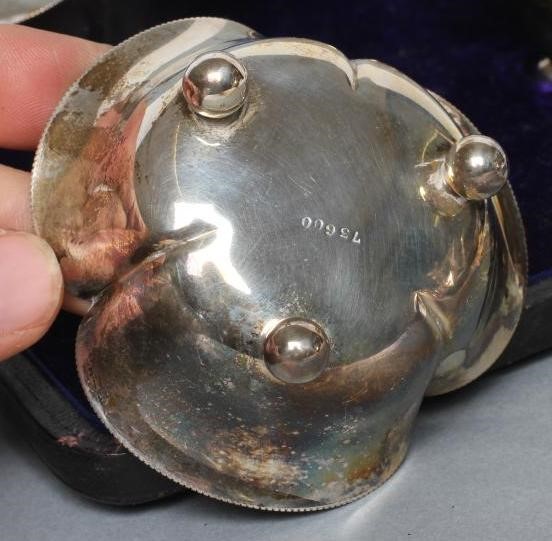 A SET OF FOUR EDWARDIAN SILVER BONBON DISHES Image