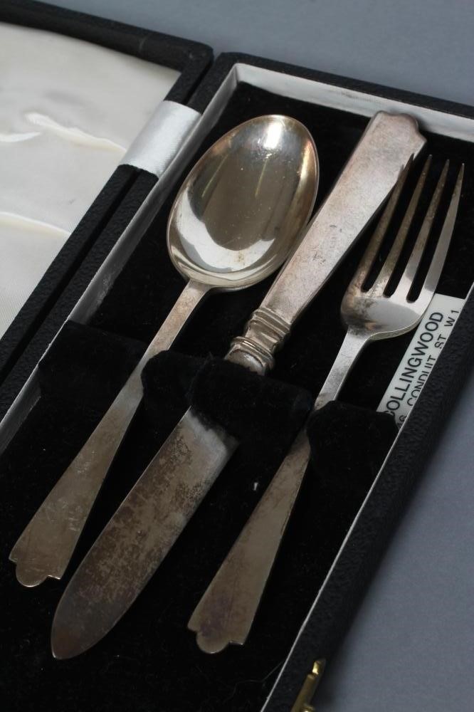 A THREE PIECE SILVER CHRISTENING SET, maker Wakely & Wheeler, London 1949/52/53, comprising dog nose Image