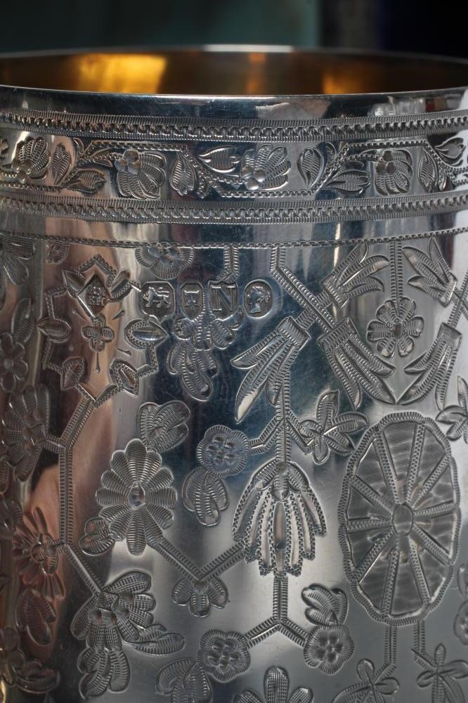 A LATE VICTORIAN SILVER CHRISTENING MUG Image