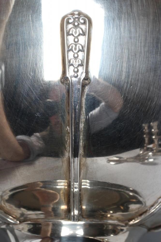 AN ARTS AND CRAFTS SILVER TWO HANDLED TROPHY Image