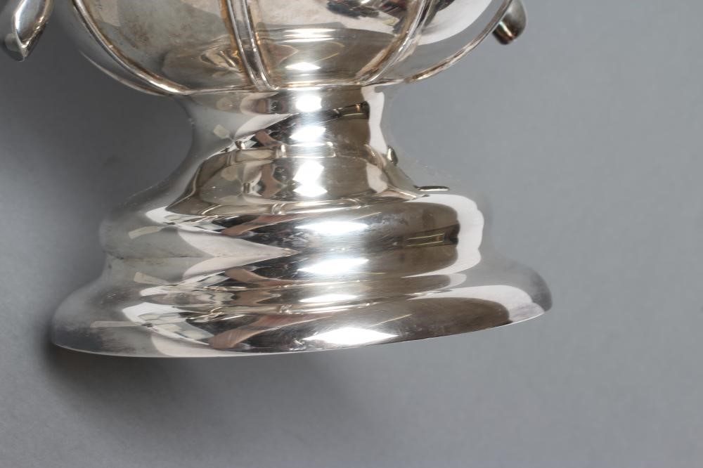 AN ARTS AND CRAFTS SILVER TWO HANDLED TROPHY Image