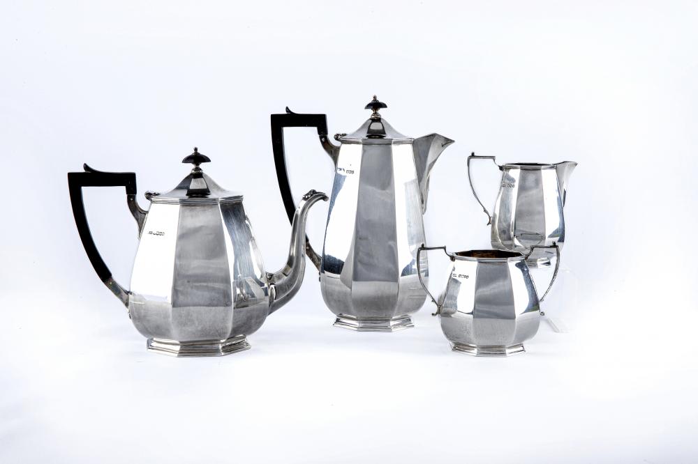 A FOUR PIECE SILVER TEA AND COFFEE SERVICE Image