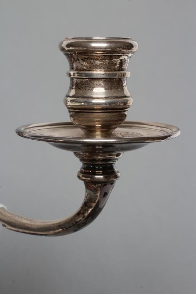 A SILVER TWO BRANCH CANDELABRUM Image