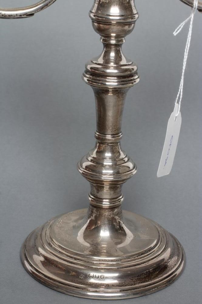A SILVER TWO BRANCH CANDELABRUM Image