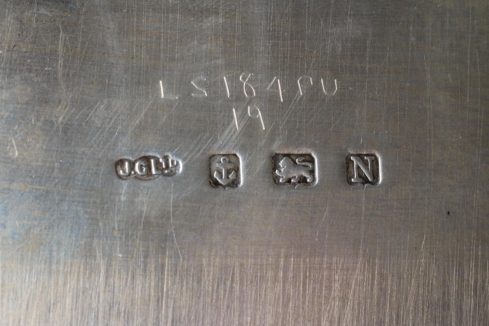 A SILVER SALVER, maker's mark J.G. Ltd., Birmingham 1937, of lobed circular form with pie-crust rim, Image