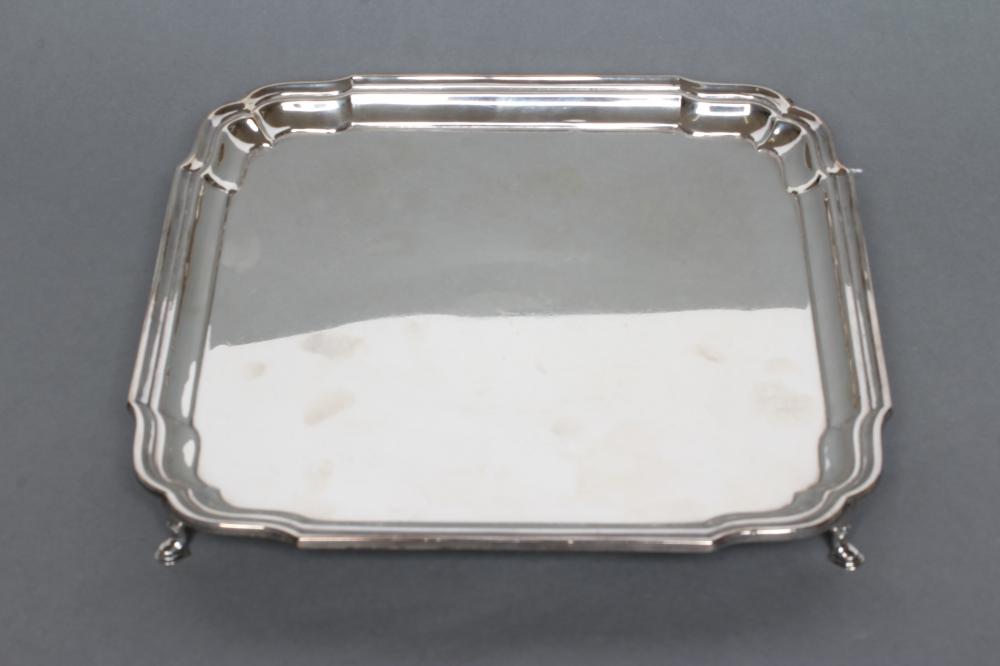 A SILVER SALVER, maker Barker Bros., Chester 1924, of square form with re-entrant corners, raised Image