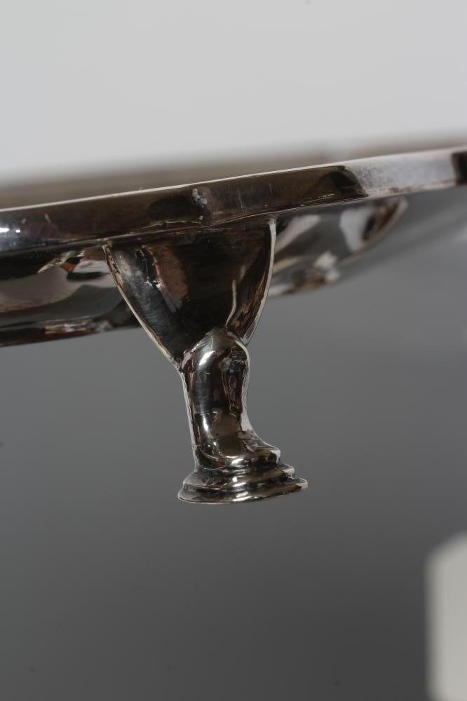 A SILVER SALVER, maker Barker Bros., Chester 1924, of square form with re-entrant corners, raised Image