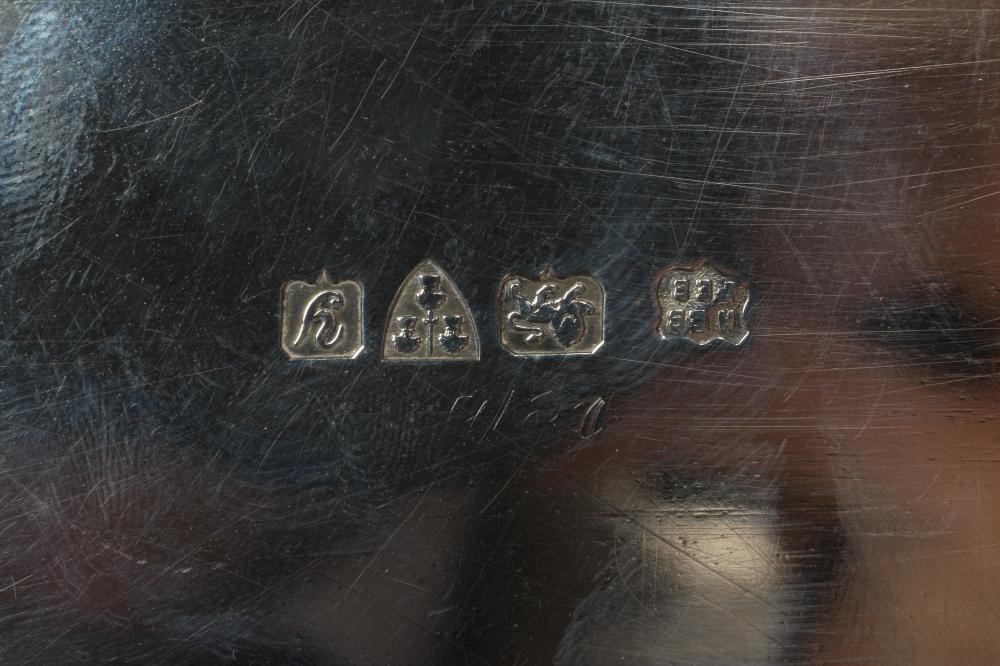 A SILVER SALVER, maker Barker Bros., Chester 1924, of square form with re-entrant corners, raised Image