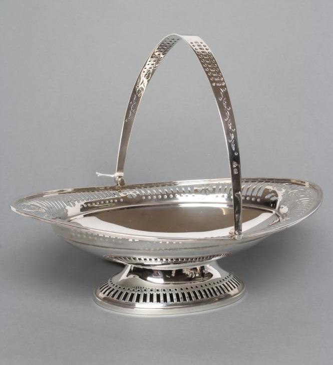 A SILVER FRUIT BASKET Image