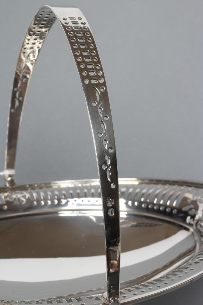 A SILVER FRUIT BASKET Image