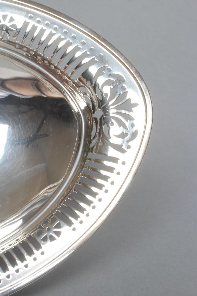 A SILVER FRUIT BASKET Image