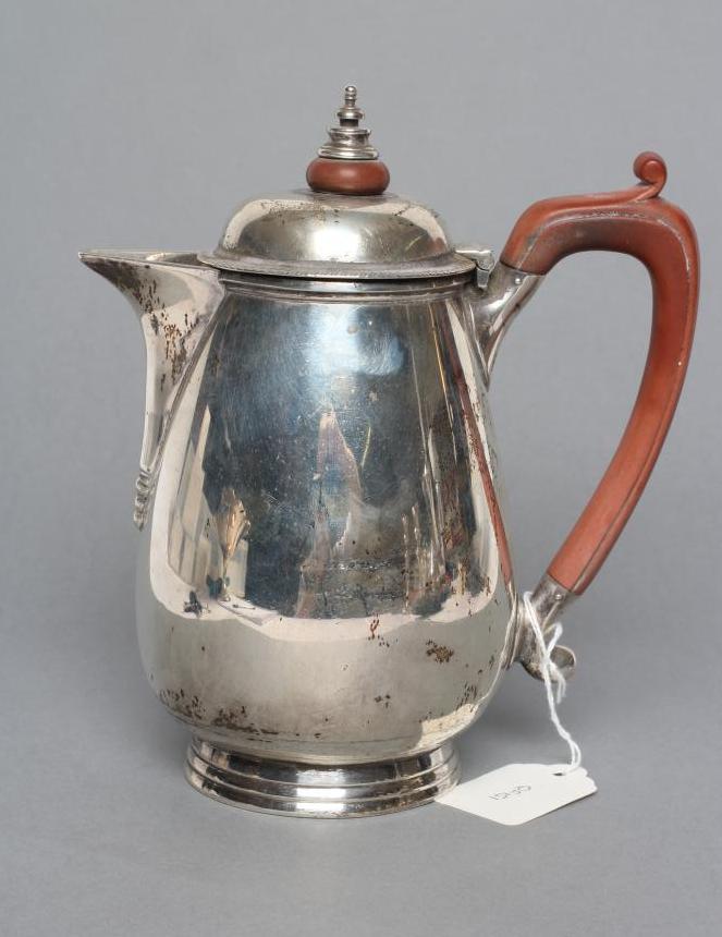 A SILVER HOT WATER JUG Image