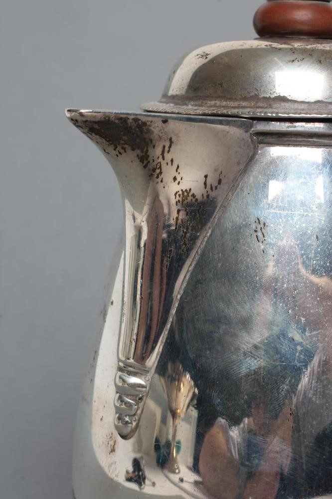 A SILVER HOT WATER JUG Image