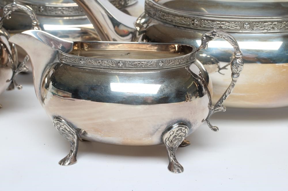 A FOUR PIECE SILVER TEA SERVICE Image