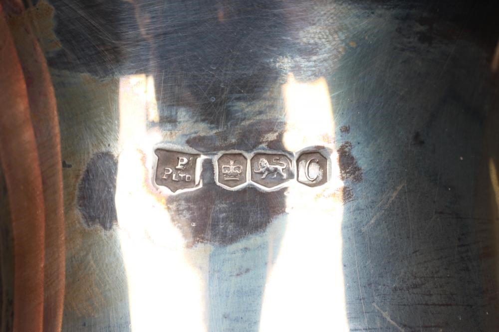 A FOUR PIECE SILVER TEA SERVICE Image