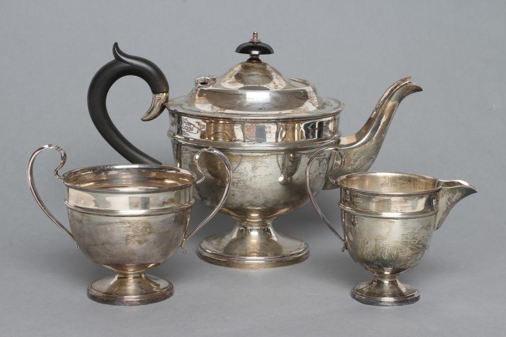 A THREE PIECE SILVER TEA SERVICE Image