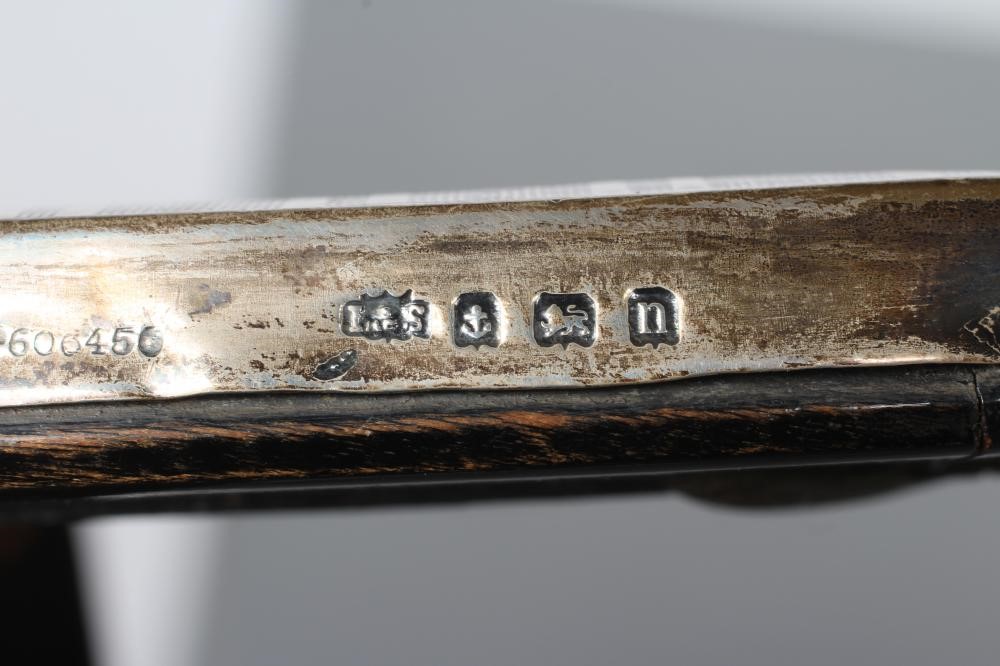 A SILVER EASEL BACK PHOTOGRAPH FRAME Image