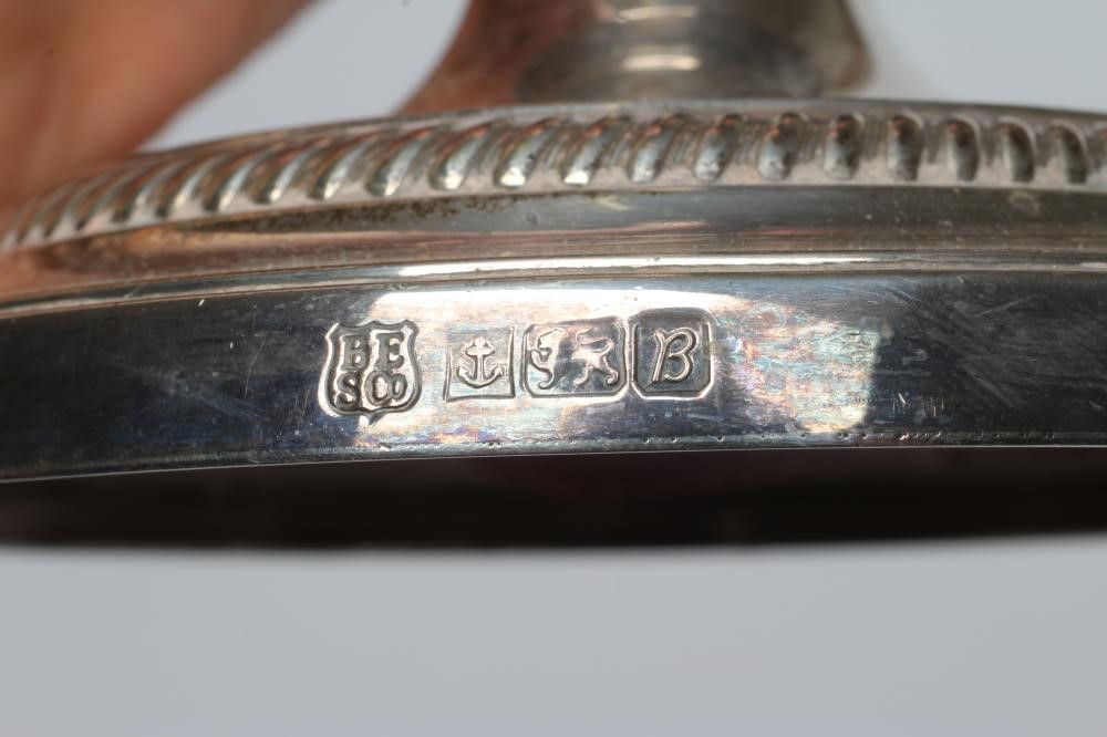 A TWO BRANCH THREE LIGHT SILVER CANDELABRUM Image