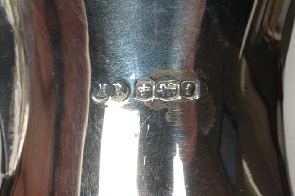 A FOUR PIECE SILVER TEA AND COFFEE SERVICE Image