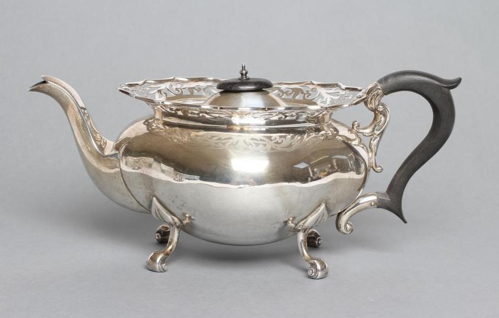 A SILVER TEAPOT Image