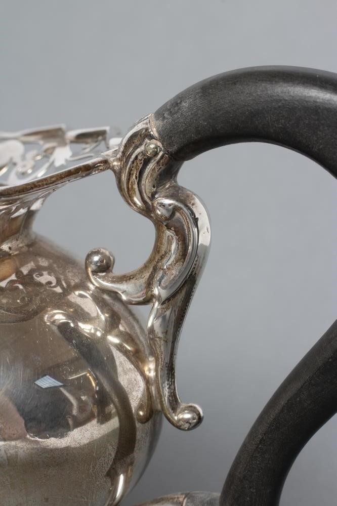 A SILVER TEAPOT Image